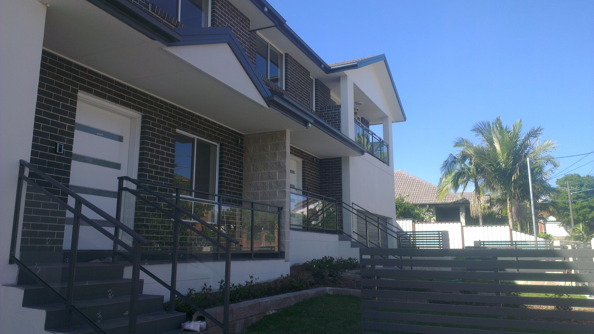 Two storey Hunter Valley home with dark face brickwork laid by GDK Bricklaying